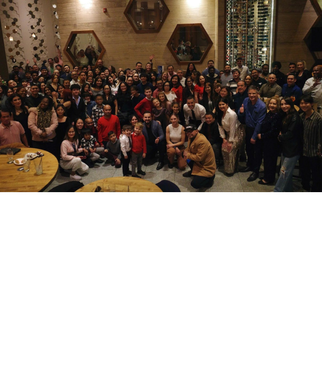 Large group of PPC team members and their families gathered at the annual Picture Perfect Cleaning Christmas party in Calgary.